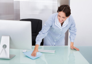 Female Worker Cleaning Office