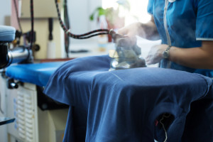 Image of laundry worker at work